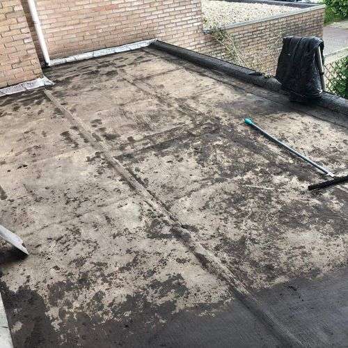 Schoonmaken van een plat dak in Lemmer Schoonmaken van een plat dak in Lemmer